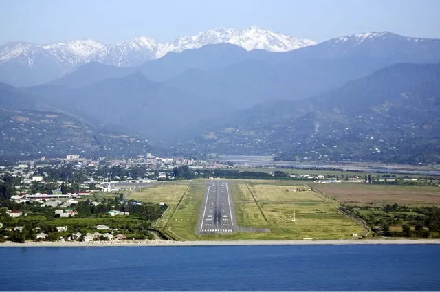 Batumi airport runway between the sea and the mountains