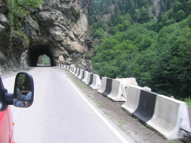 A tunnel cut into the rock on the mountain road to Svaneti